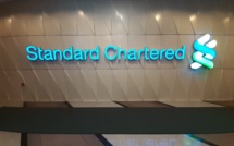 Standard Chartered bank profits more than double